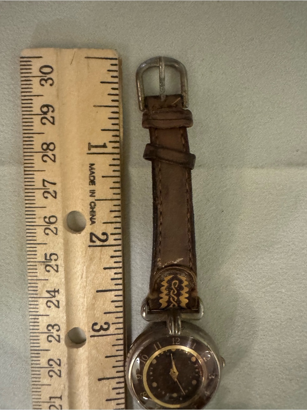 Women’s Brown Leather Watch with Decorative Dial Accents - Picture 8 of 16